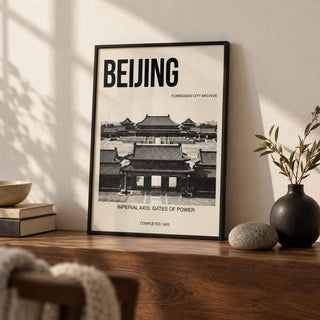 Beijing Architecture Art Print, a small A4 framed print leaning on a walnut shelf in a living room