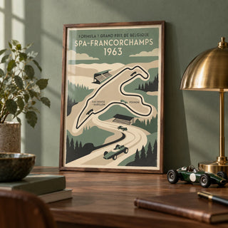 Belgian Race Circuit Map Poster, a small A4 framed print leaning on a walnut desk