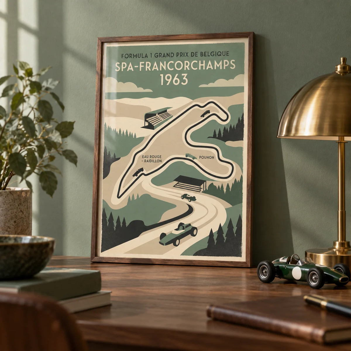 Belgian Race Circuit Map Poster, a small A4 framed print leaning on a walnut desk