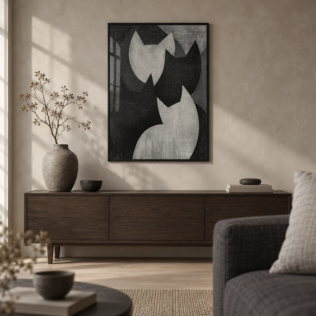 Big Cat Art, framed on the wall of a calm Japandi living room with a warm grey limewashed wall and a pale oak floor