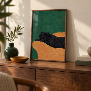 Big Cat Art Print, a small A4 framed print leaning on a walnut sideboard in a living room
