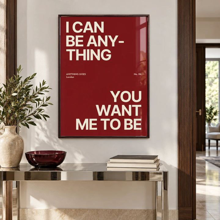 Big Text Poster, framed on the wall of a bright entryway with a chrome side table
