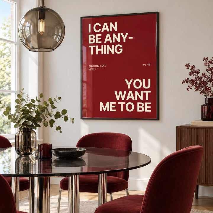 Big Text Poster, framed on the wall of a dining room with burgundy velvet chairs