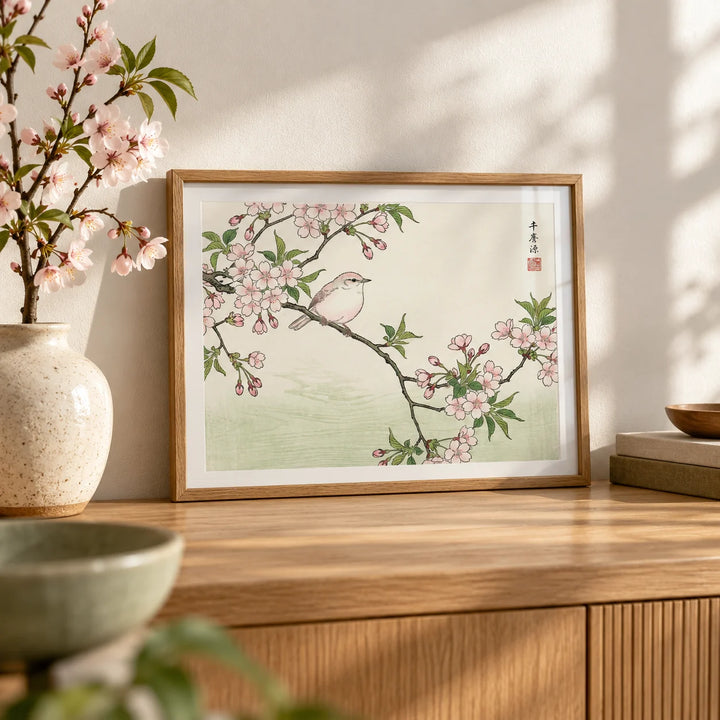Bird Cherry Blossom Art Print, a small A4 framed print leaning on an oak sideboard in a living room