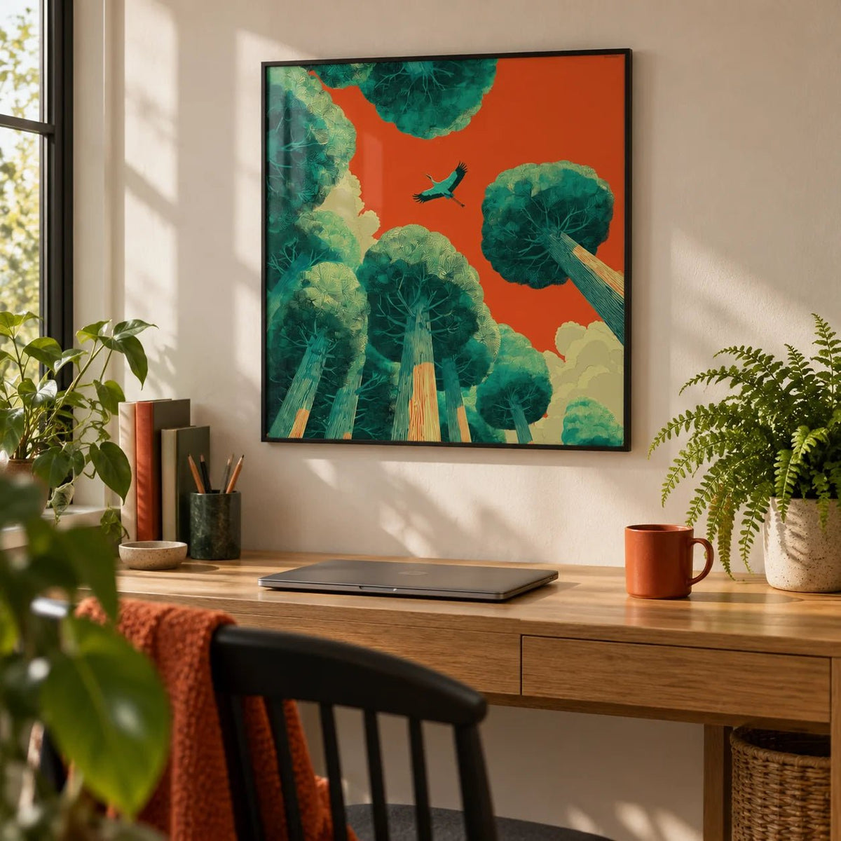 Bird In Flight Wall Art, framed on the wall of a home office with plants