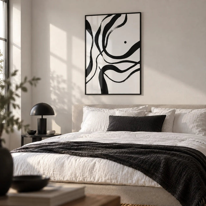 Black And White Art, framed on the wall of a crisp modern bedroom