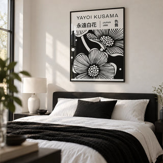 Black and White Art Flowers, framed on the wall of a calm modern bedroom with a soft white wall