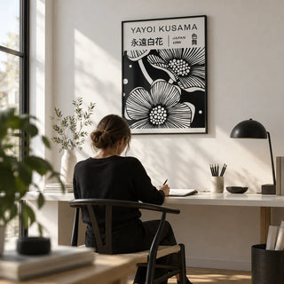 Black and White Art Flowers, framed on the wall of a modern design studio with a white wall and a pale oak floor in a home office