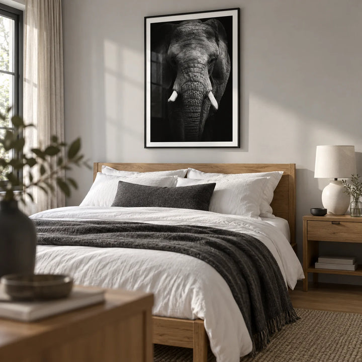 Elephant Print, framed on the wall of a calm adult bedroom with a pale grey wall and warm oak floor