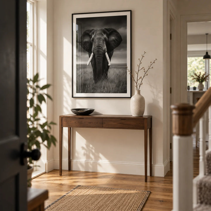 Black And White Elephant Print, framed on the wall of a welcoming hallway in a renovated UK semi-detached home with warm white walls and oak floorboards