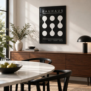 Black and White Geometric Art, framed on the wall of a modern dining room with a white wall