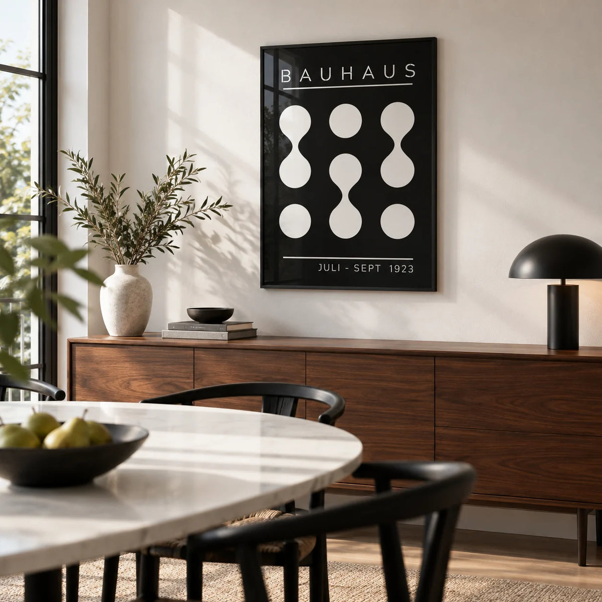 Black and White Geometric Art, framed on the wall of a modern dining room with a white wall