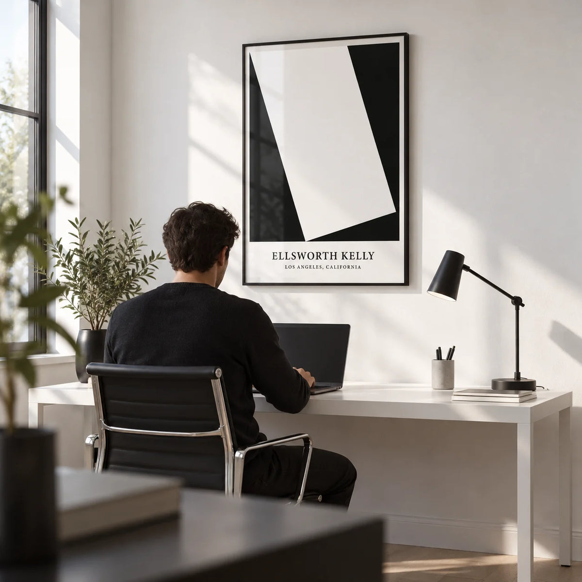 Black and White Office Print, framed on the wall of a crisp modern home office with a white wall