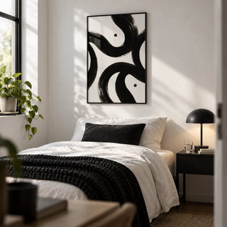 Black and White Posters, framed on the wall of a calm single bedroom for a young adult (18-25) with a white wall