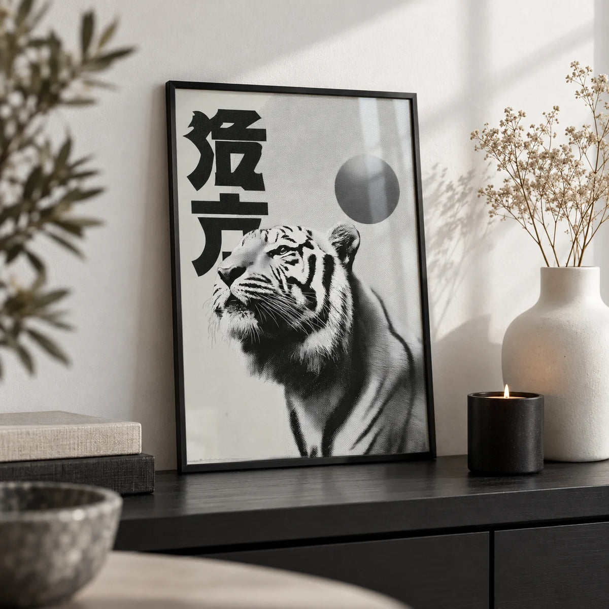 Black And White Tiger Print, a small A4 framed print leaning on a black shelf in a living room
