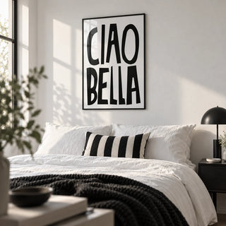 Black and White Typography Poster, framed on the wall of a crisp monochrome bedroom in a first flat