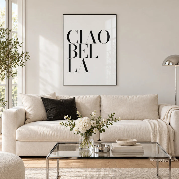 Black and White Typography Poster, framed on the wall of a lounge with a cream sofa