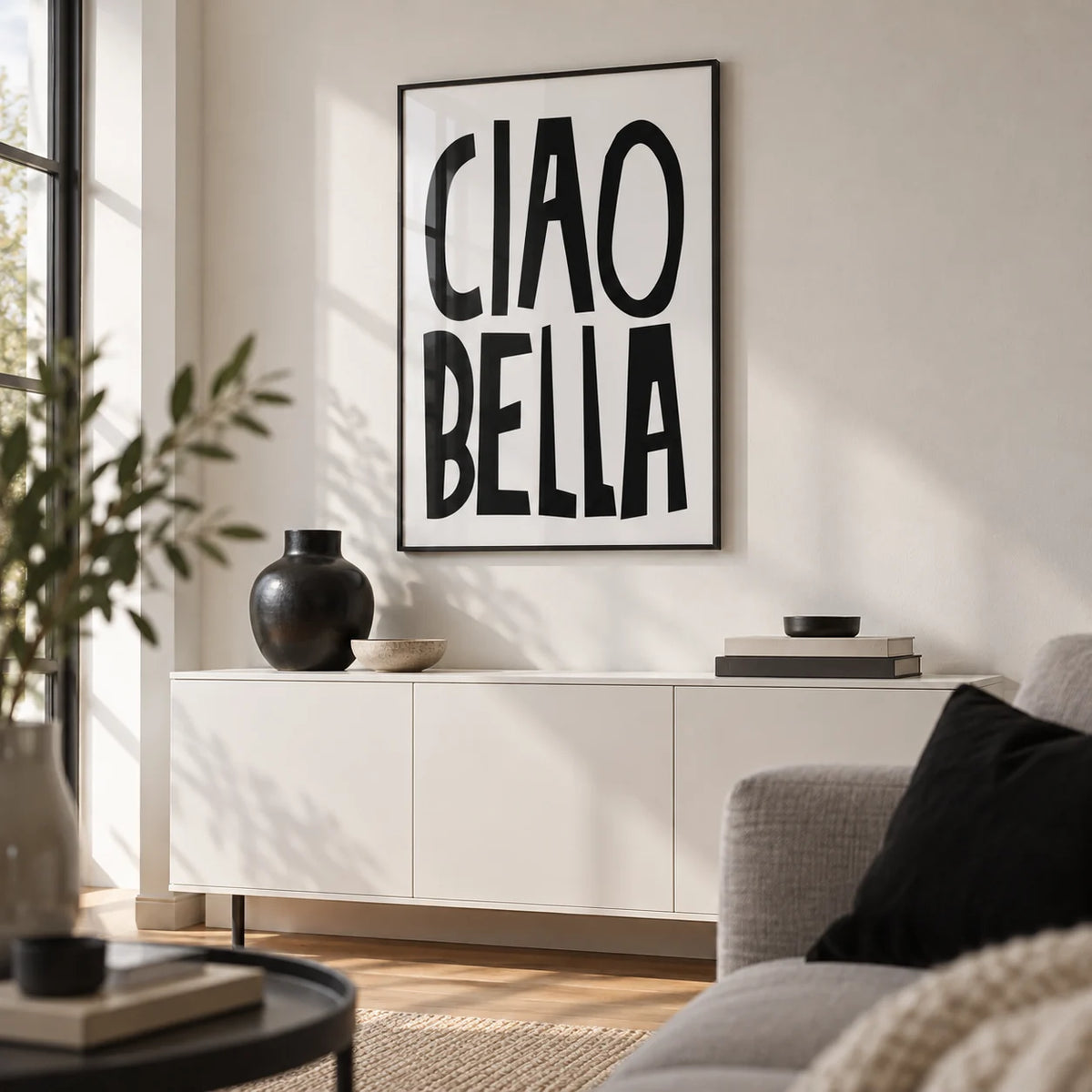 Black and White Typography Poster, framed on the wall of a modern living room