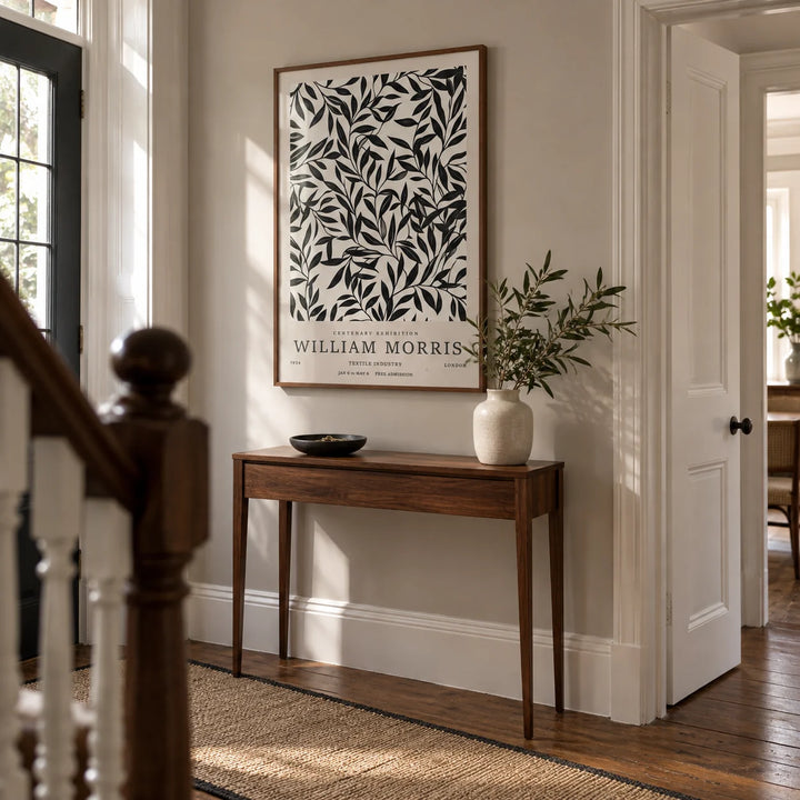 Black and White Vintage Wall Art, framed on the wall of a welcoming hallway in a British Edwardian house with pale warm grey walls and simple white panelled doors
