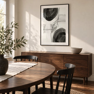 Black And White Wall Art, framed on the wall of a compact modern dining room in a UK flat with a warm white wall and a walnut floor