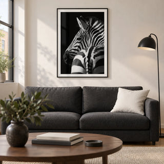 Black And White Zebra Print, framed on the wall of a modern living room in a UK city flat with a soft white wall and warm oak floor