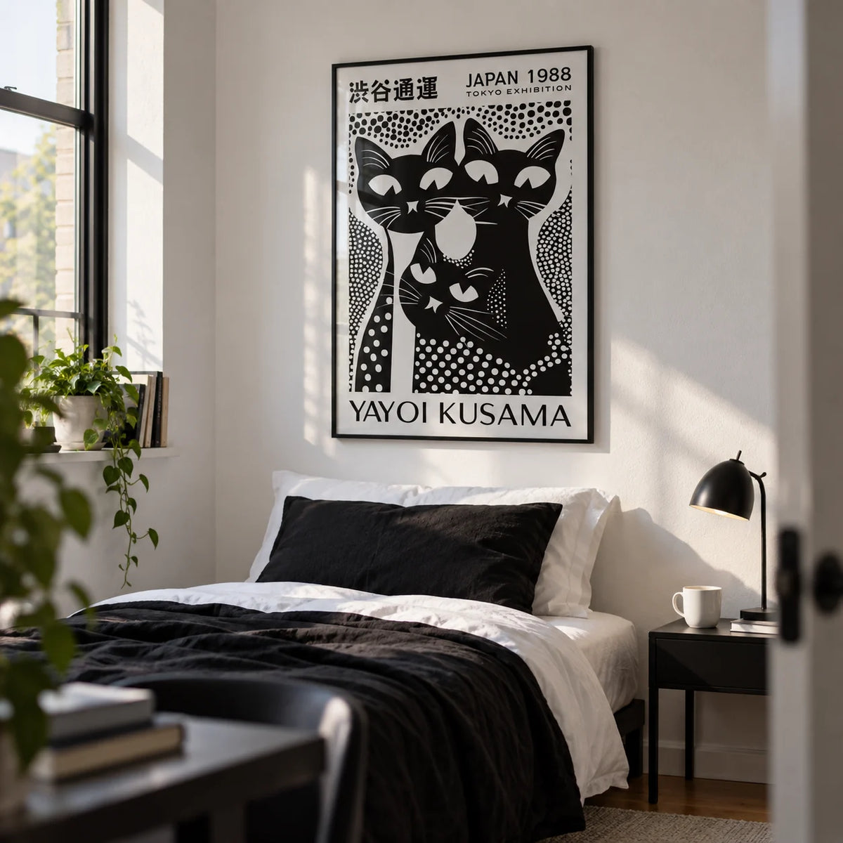 Black Cat Poster Art, framed on the wall of a crisp uni bedroom (18-21) with a white wall