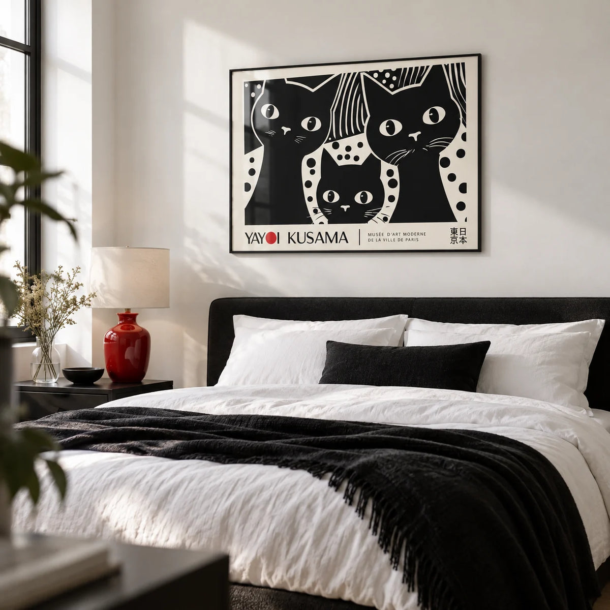 Black Cat Wall Art, framed on the wall of a crisp monochrome bedroom with a white wall