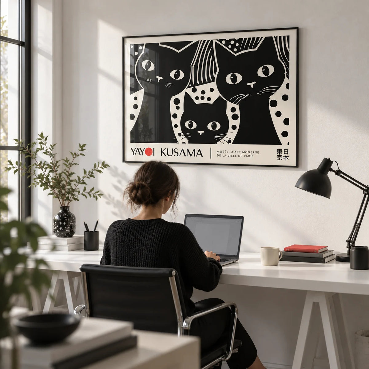 Black Cat Wall Art, framed on the wall of a monochrome home office with a white wall