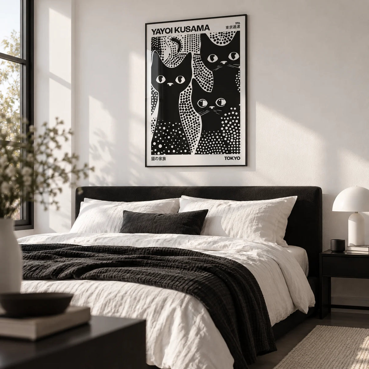Black Cats Poster, framed on the wall of a crisp monochrome bedroom with a white wall