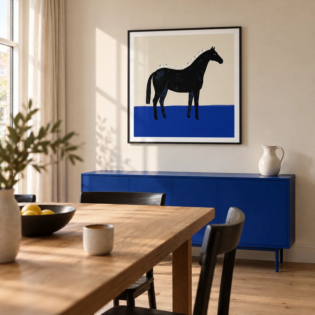 Black Horse Wall Art, framed on the wall of a modern dining room in a UK maisonette with a warm white wall
