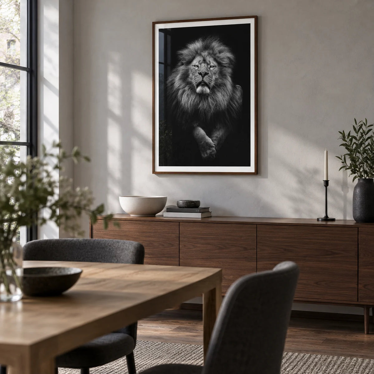 Black Lion Art Print, framed on the wall of a modern dining room in a UK townhouse with a light grey plaster wall