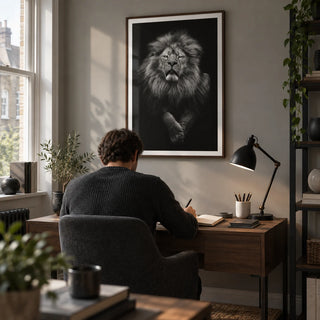 Black Lion Art Print, framed on the wall of a quiet home study in a UK terraced house with a soft grey wall