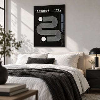 Black Minimalist Art, framed on the wall of a crisp monochrome bedroom