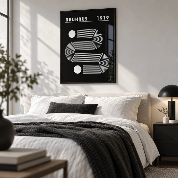 Black Minimalist Art, framed on the wall of a crisp monochrome bedroom