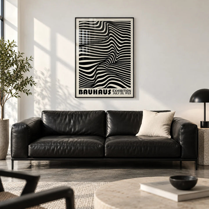 Black Minimalist Wall Art, framed on the wall of a modern city flat living room with a polished concrete floor and a white wall