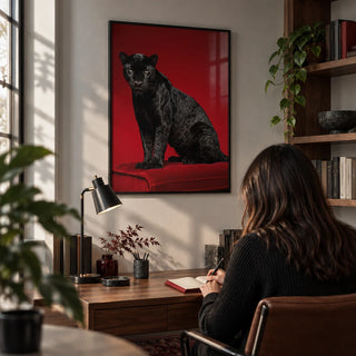 Black Panther Art Print, framed on the wall of a compact contemporary home study with a pale grey wall and fitted walnut shelves