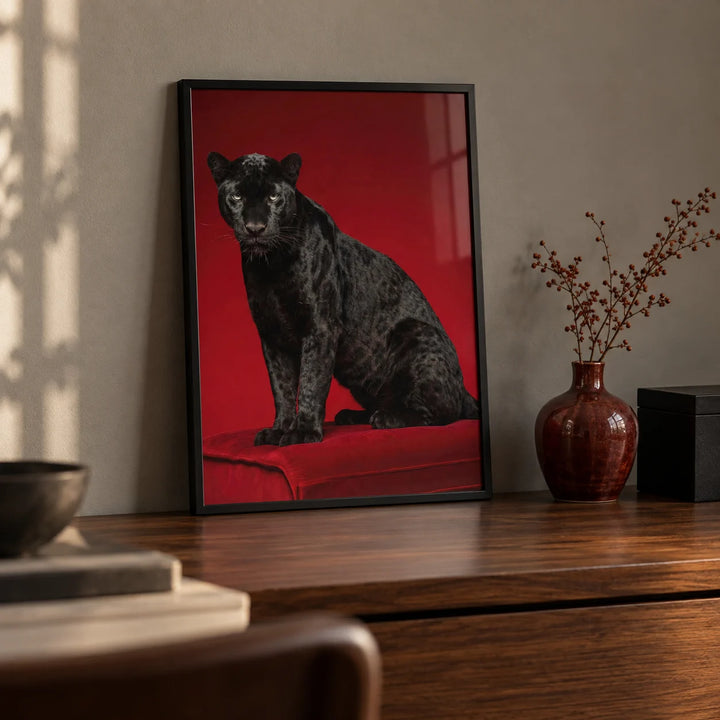 Black Panther Art Print, a small A4 framed print leaning on a walnut desk