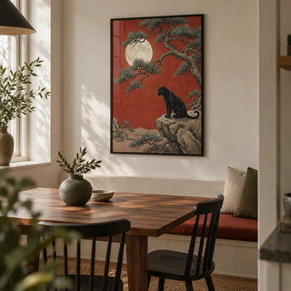 Black Panther Moon Print, framed on the wall of a compact modern dining room in a UK flat with a warm off-white wall and a built-in bench