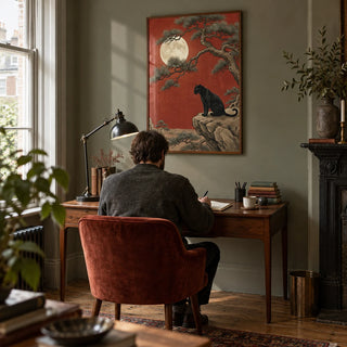 Black Panther Moon Print, framed on the wall of a quiet home study in a Victorian terrace with a muted grey-green wall and oak floorboards