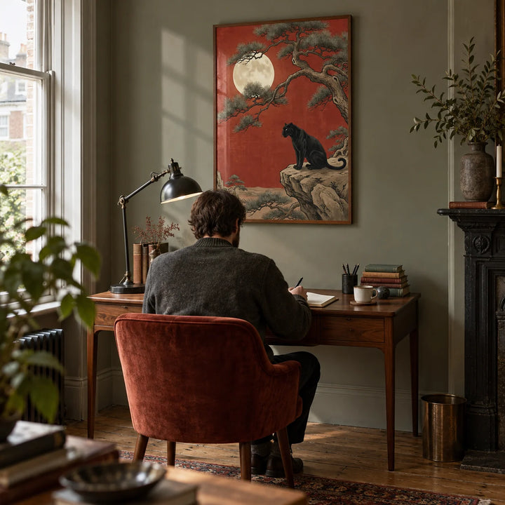 Black Panther Moon Print, framed on the wall of a quiet home study in a Victorian terrace with a muted grey-green wall and oak floorboards