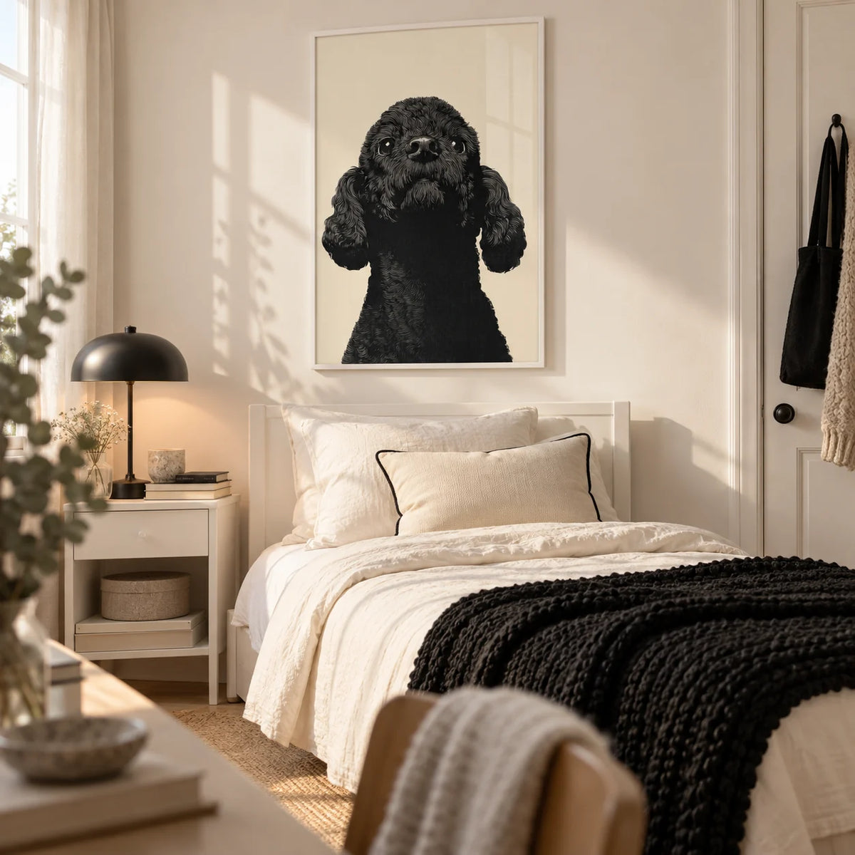 Black Poodle Art, framed on the wall of a stylish single bedroom for a young woman (18-28)