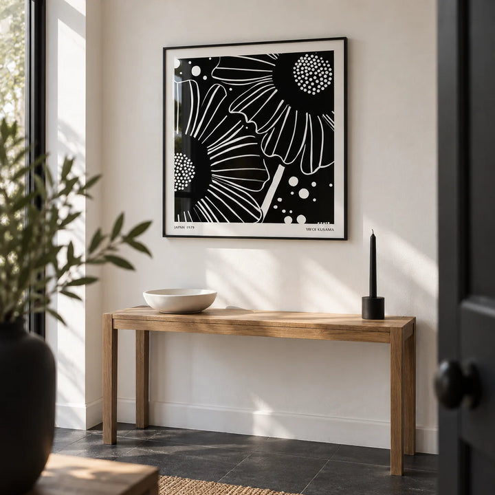 Black White Floral Art, framed on the wall of a crisp entrance hall with a white wall and a plain black slate floor
