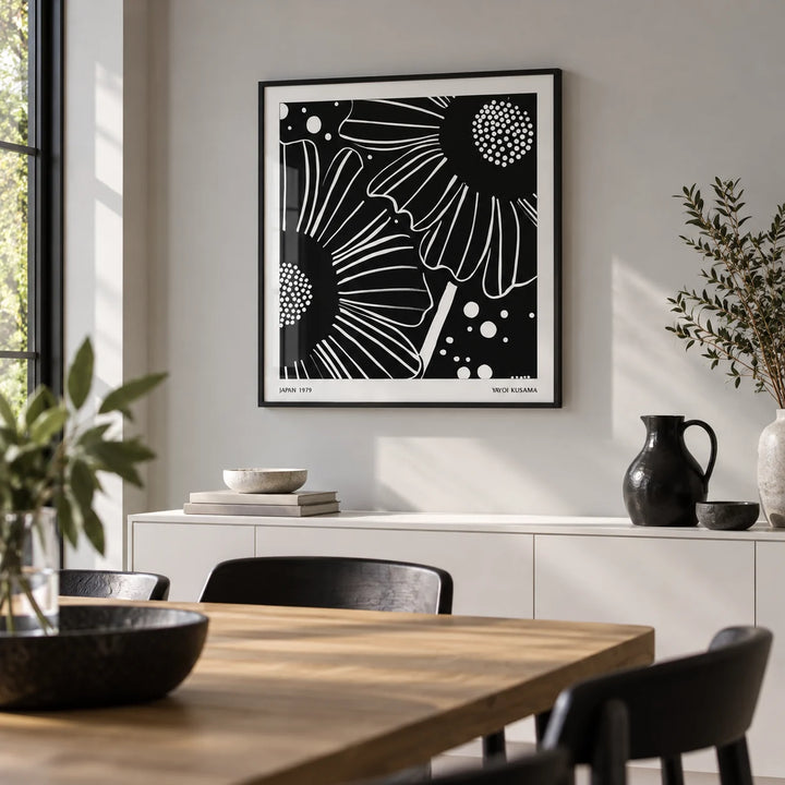 Black White Floral Art, framed on the wall of a modern dining room with a pale grey wall
