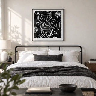 Black White Floral Art, framed on the wall of a monochrome bedroom with a soft white wall
