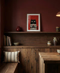 Nestaurant interior with wooden shelves, a framed picture of a cat, and various decor items.