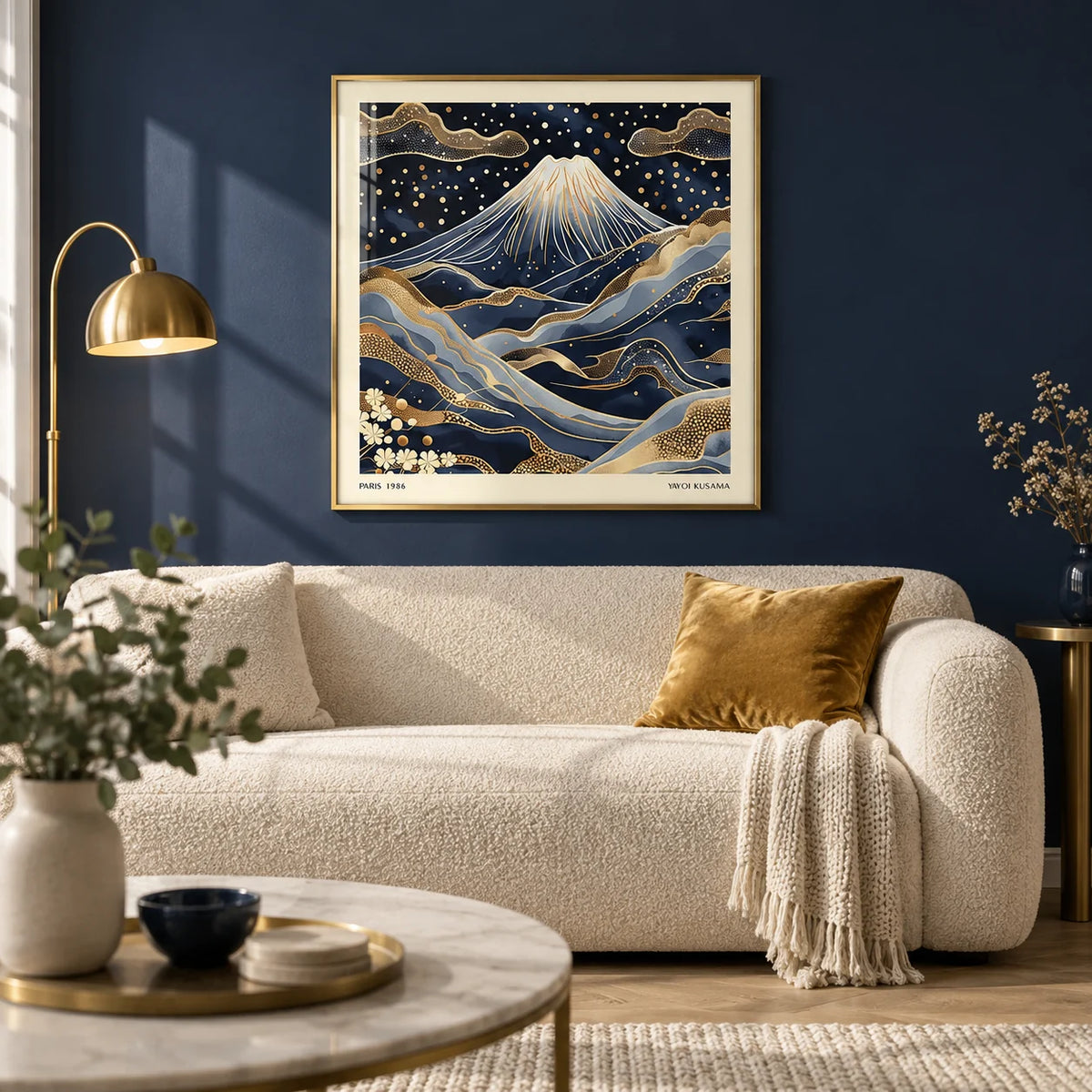 Blue and Gold Wall Art, framed on the wall of an elegant living room with a deep navy painted wall and a pale oak floor