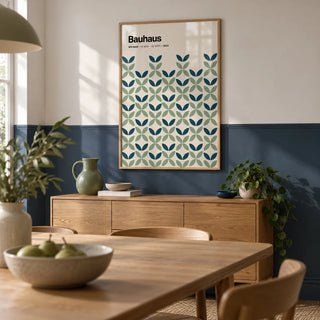 Blue and Green Wall Art, framed on the wall of a dining room with a plain navy painted lower wall and white above