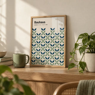 Blue and Green Wall Art, a small A4 framed print leaning on an oak shelf in a living room