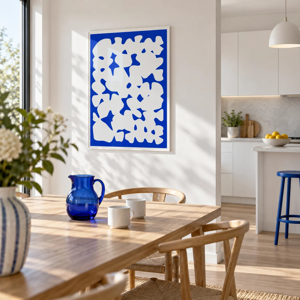 Blue And White Modern Art, framed on the wall of a modern open-plan kitchen-diner