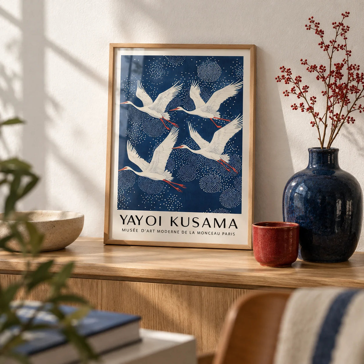 Blue and White Prints, a small A4 framed print leaning on an oak shelf in a living room